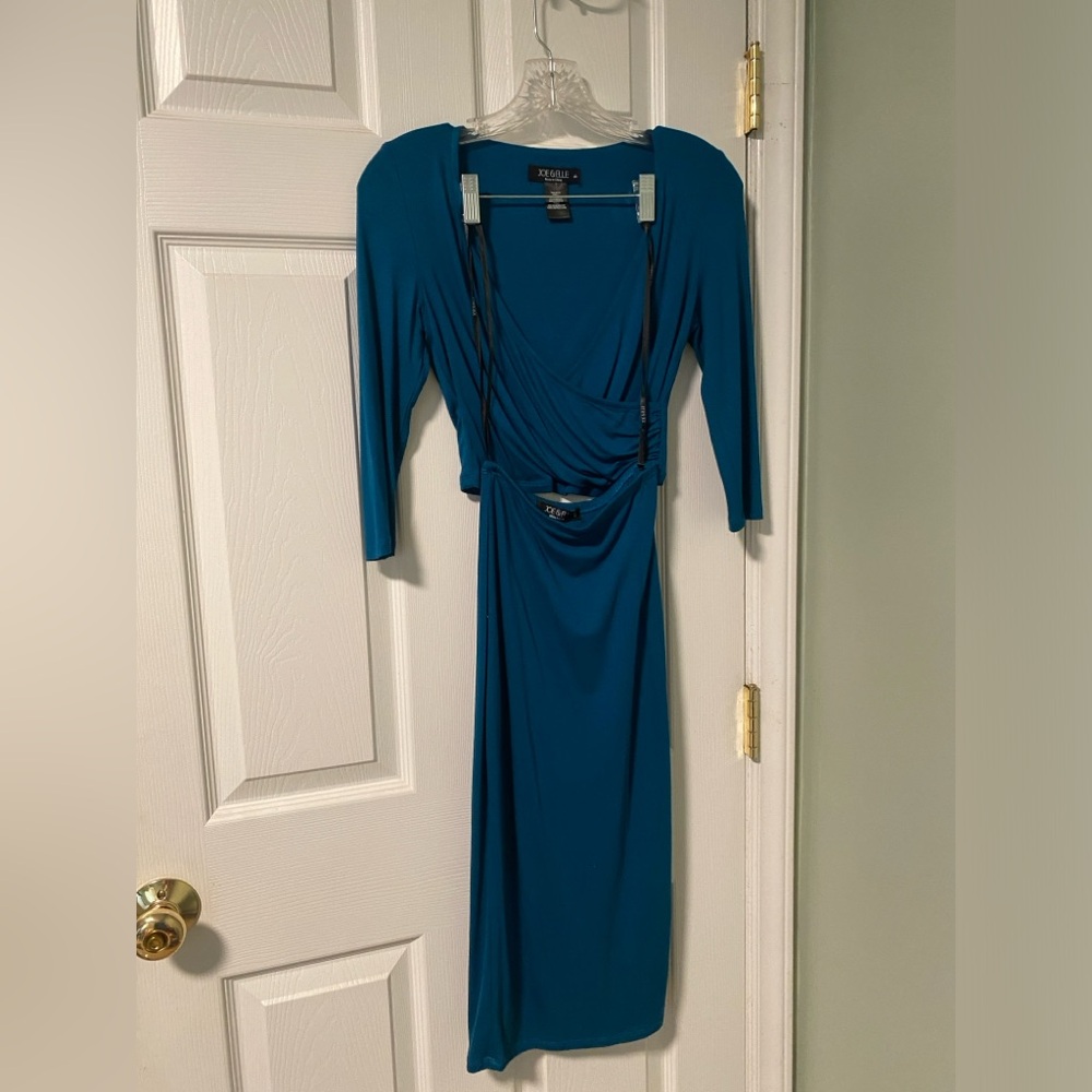 Turquoise 2 piece body-con quarter sleeve with midi skirt size small